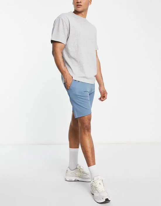 https://images.styletyx.com/images/2-pack-raw-edge-jersey-shorts-in-blue-stone-le-breve-13711971_4.webp