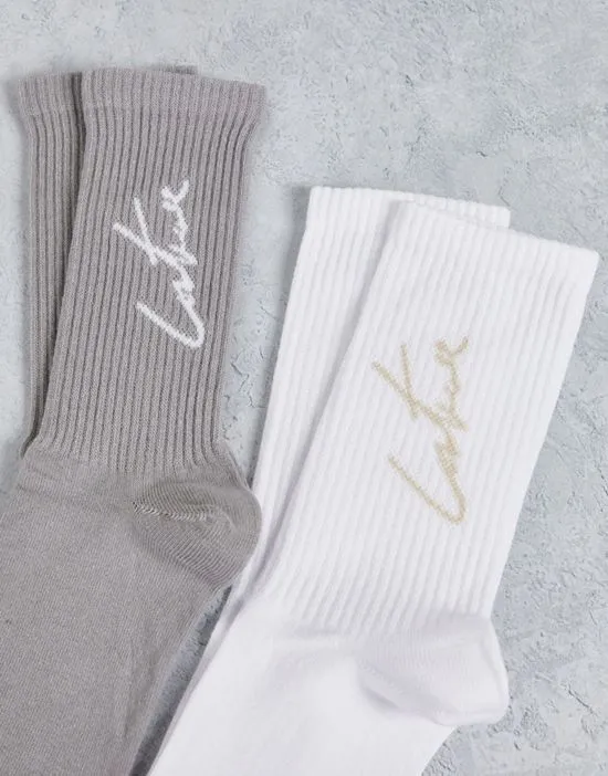 https://images.styletyx.com/images/2-pack-sports-socks-in-white-and-taupe-the-couture-club-13063172_3.webp