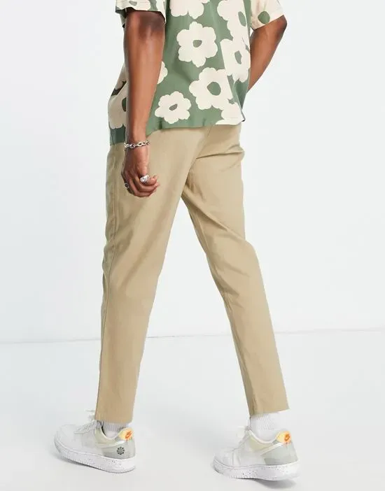https://images.styletyx.com/images/2-pack-tapered-chinos-in-light-khaki-and-dark-khaki-save-asos-design-1913334_3.webp