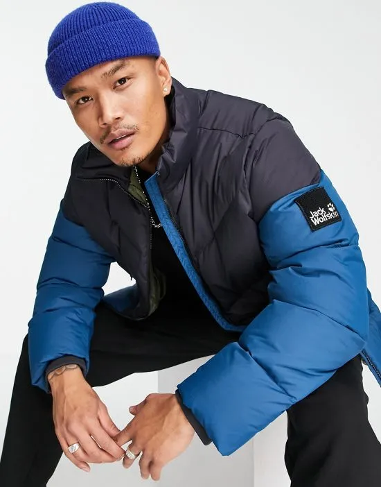 https://images.styletyx.com/images/365-fearless-down-puffer-jacket-in-blue-jack-wolfskin-1815314_1.webp