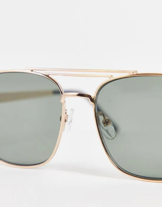 https://images.styletyx.com/images/70s-aviator-sunglasses-in-gold-metal-with-retro-lens-and-brow-bar-detail-gold-asos-design-1919124_3.webp