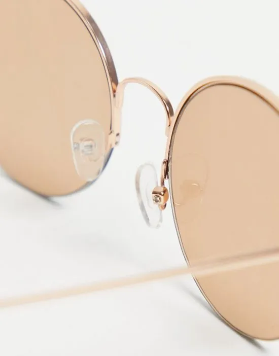 https://images.styletyx.com/images/70s-round-sunglasses-with-light-brown-lens-in-gold-asos-design-13575323_3.webp