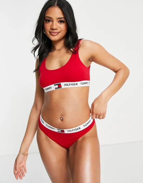 https://images.styletyx.com/images/85-logo-unlined-bralette-in-red-tommy-hilfiger-1849979_3.webp
