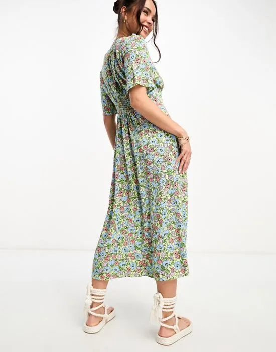 https://images.styletyx.com/images/alexa-shirred-midi-dress-in-vintage-green-floral-nobody-s-child-13439596_4.webp