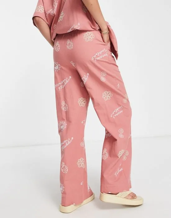 https://images.styletyx.com/images/all-over-embroidered-pants-in-terracotta-part-of-a-set-damson-madder-1905976_2.webp