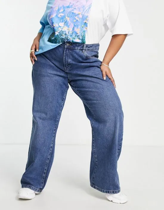 https://images.styletyx.com/images/amanda-high-waisted-dad-jeans-in-mid-blue-noisy-may-curve-2626917_4.webp