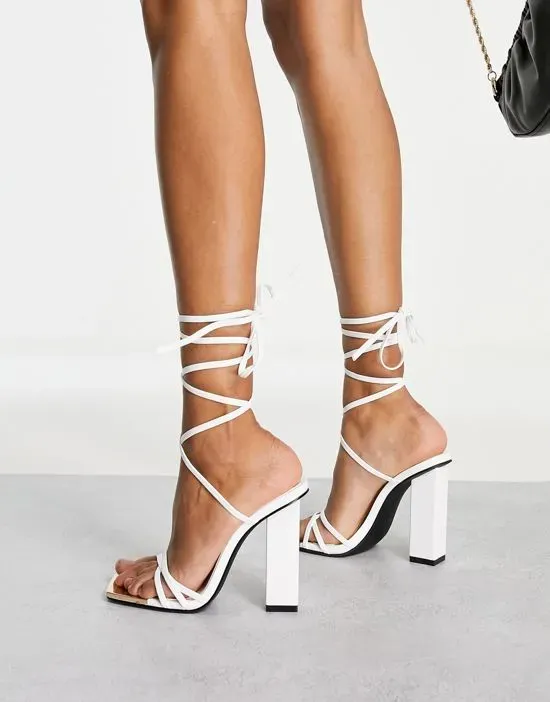 https://images.styletyx.com/images/amira-tie-up-block-heel-sandals-in-white-public-desire-1738786_2.webp