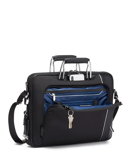 https://images.styletyx.com/images/arrive-hannover-slim-briefcase-tumi-3167846_3.webp