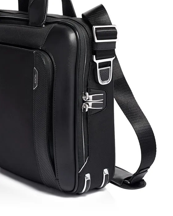 https://images.styletyx.com/images/arrive-sadler-briefcase-tumi-2277402_5.webp