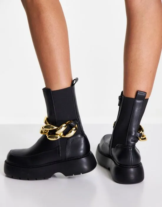 https://images.styletyx.com/images/artist-chelsea-boots-with-chain-in-black-asos-design-2789657_2.webp