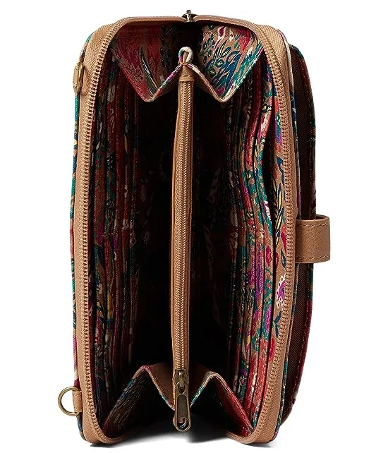 https://images.styletyx.com/images/artist-circle-large-smartphone-crossbody-the-sak-1741728847_3.webp