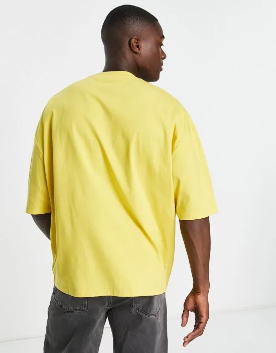 https://images.styletyx.com/images/asos-actual-oversized-t-shirt-with-boucle-health-wellbeing-logo-in-yellow-asos-design-1852465_4.webp