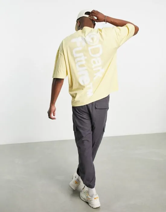 https://images.styletyx.com/images/asos-dark-future-oversized-t-shirt-with-front-and-back-blurred-graphic-prints-in-yellow-asos-design-2818345_4.webp