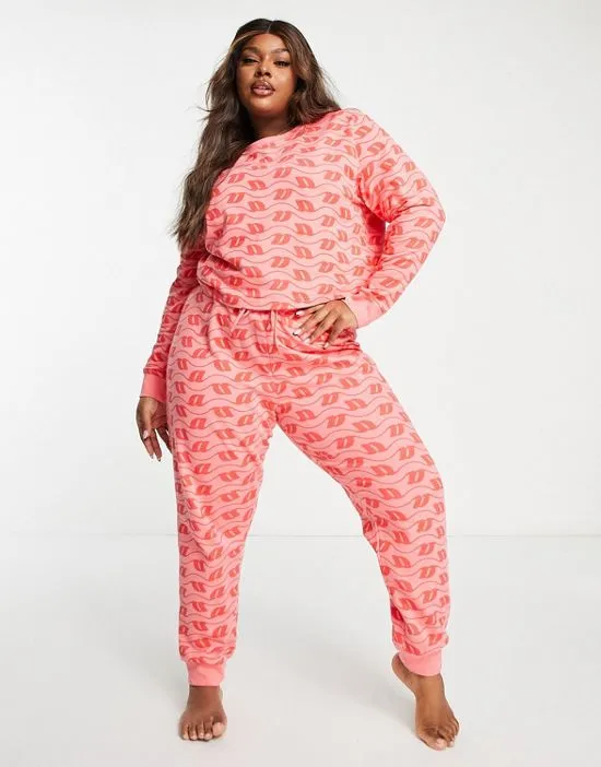 https://images.styletyx.com/images/asos-design-curve-lounge-monogram-print-sweatshirt-sweatpants-set-in-pink-red-asos-design-2568837_1.webp