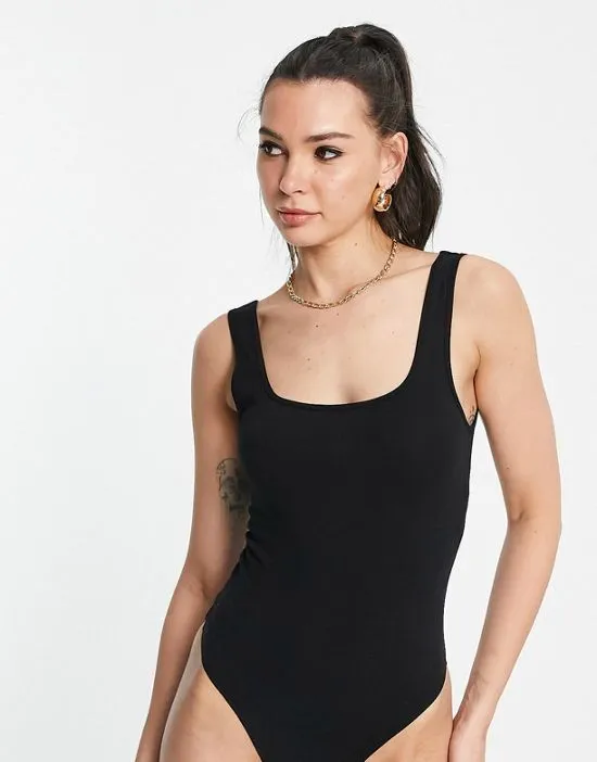 https://images.styletyx.com/images/asos-design-tall-tank-top-bodysuit-with-scoop-front-and-back-in-black-asos-design-1897358_3.webp