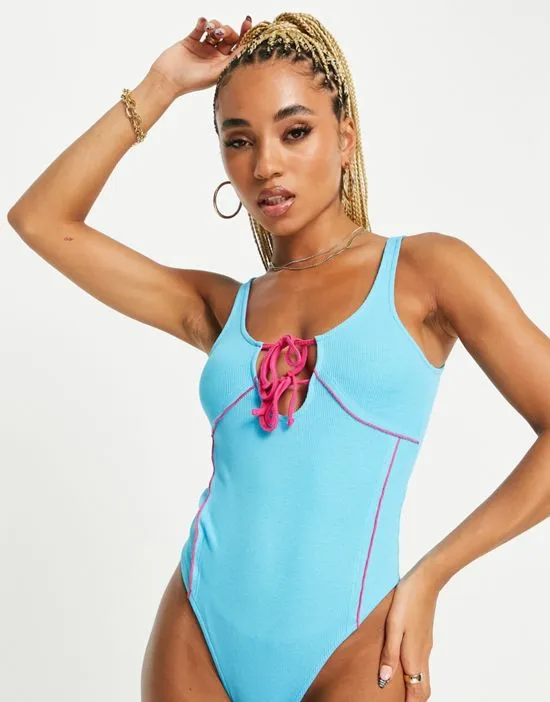 https://images.styletyx.com/images/asyou-tie-up-contrast-seam-detail-ribbed-bodysuit-in-blue-asyou-1887308_4.webp