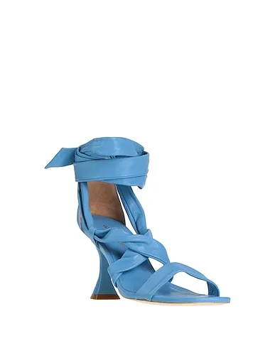 https://images.styletyx.com/images/azure-leather-sandals-gold-rouge-13027919_2.webp