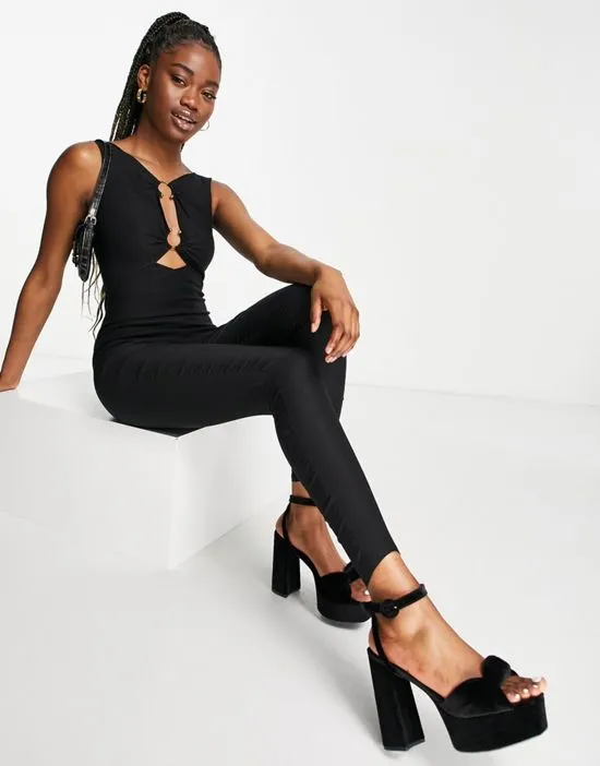 https://images.styletyx.com/images/band-of-stars-premium-bandage-jumpsuit-with-trim-detail-in-black-band-of-stars-2934641_3.webp