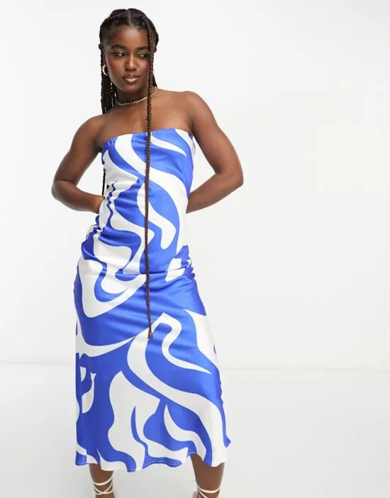 https://images.styletyx.com/images/bandeau-satin-midi-dress-in-blue-swirl-print-sndys-629788786_1.webp