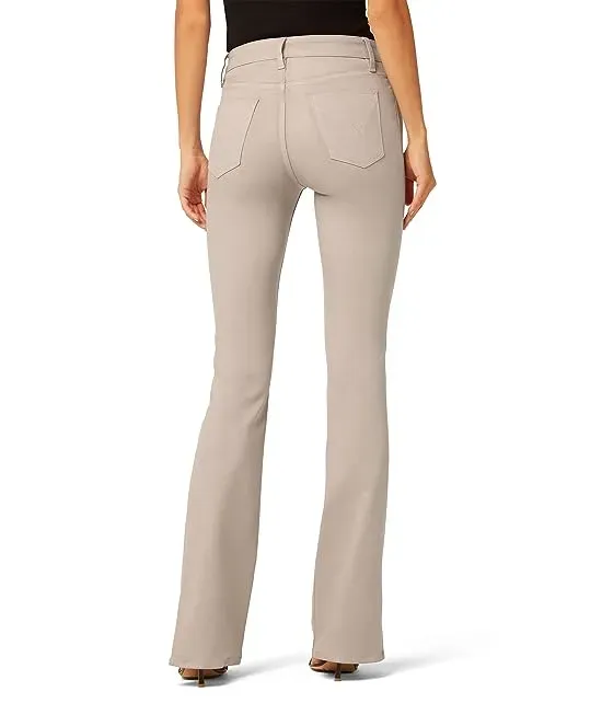 https://images.styletyx.com/images/barbara-high-rise-bootcut-w-outseam-slit-in-coated-moonrock-hudson-jeans-13452030_3.webp