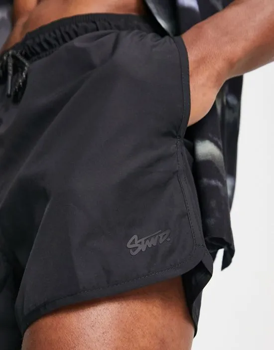 https://images.styletyx.com/images/basic-swim-shorts-in-black-pull-bear-2983078_4.webp