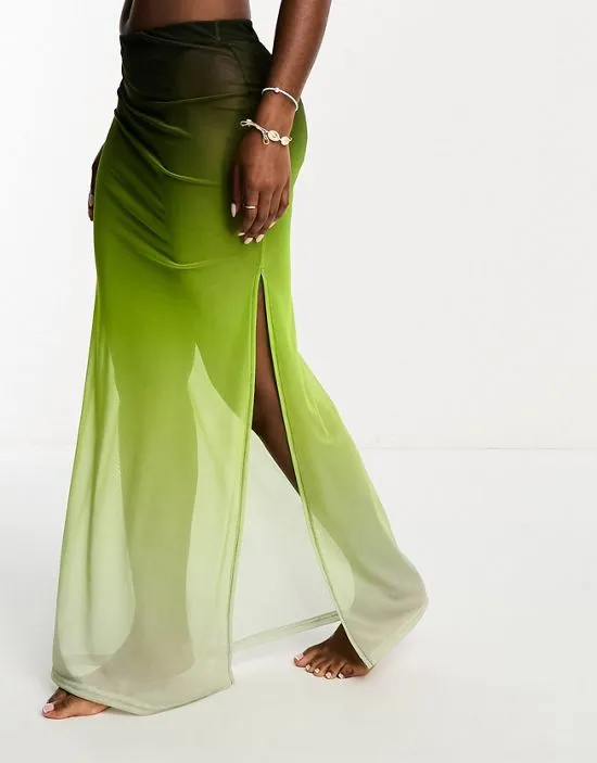 https://images.styletyx.com/images/beach-ombre-mesh-maxi-skirt-in-green-miss-selfridge-1142196008_4.webp