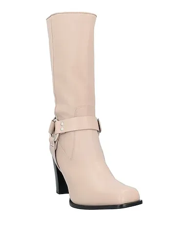 https://images.styletyx.com/images/beige-boots-altuzarra-1287047_2.webp