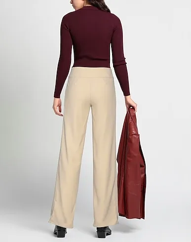 https://images.styletyx.com/images/beige-crepe-casual-pants-rubendellariccia-3247119_3.webp