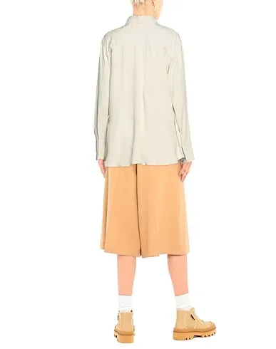 https://images.styletyx.com/images/beige-crepe-solid-color-shirts-blouses-rejina-pyo-1448263_3.webp