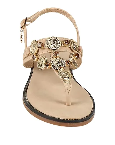 https://images.styletyx.com/images/beige-flip-flops-laura-biagiotti-1003862797_4.webp
