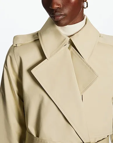 https://images.styletyx.com/images/beige-gabardine-double-breasted-pea-coat-cos-13220029_4.webp