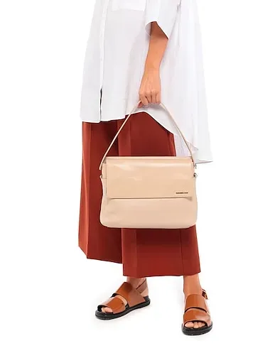https://images.styletyx.com/images/beige-handbag-mandarina-duck-1474868_3.webp