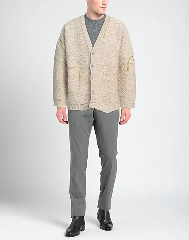 https://images.styletyx.com/images/beige-knitted-cardigan-paura-872250174_2.webp