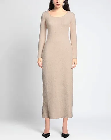 https://images.styletyx.com/images/beige-knitted-long-dress-alanui-13392729_2.webp