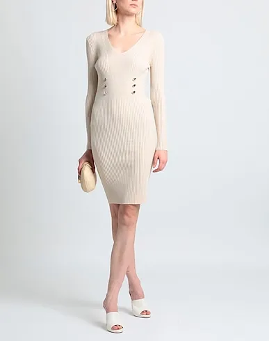 https://images.styletyx.com/images/beige-knitted-midi-dress-rinascimento-1007140118_2.webp