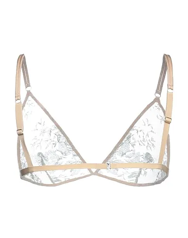 https://images.styletyx.com/images/beige-lace-bra-christies-1431647_2.webp