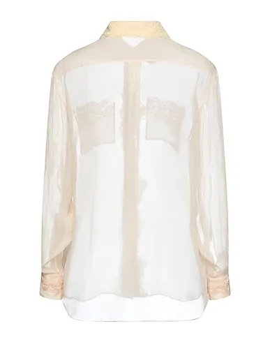 https://images.styletyx.com/images/beige-lace-lace-shirts-blouses-burberry-2581946_2.webp