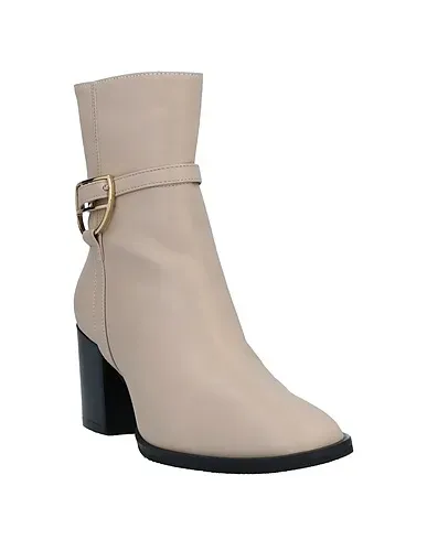 https://images.styletyx.com/images/beige-leather-ankle-boot-prezioso-1442915_2.webp