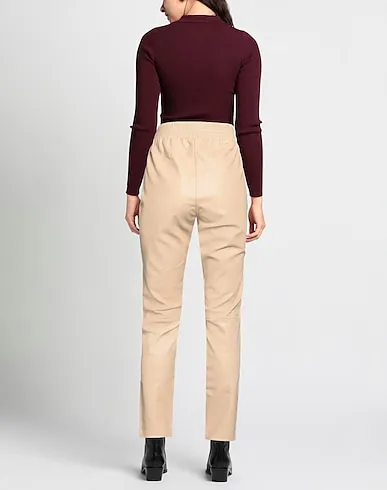 https://images.styletyx.com/images/beige-leather-casual-pants-goosecraft-1959104315_3.webp