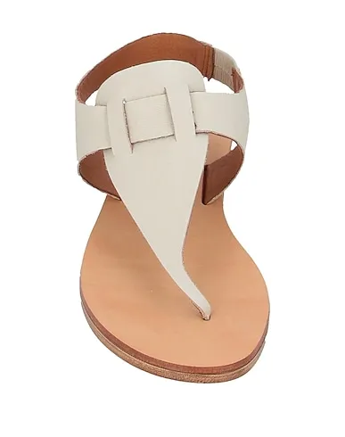 https://images.styletyx.com/images/beige-leather-flip-flops-inuovo-3146584_4.webp