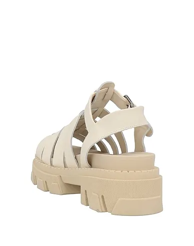 https://images.styletyx.com/images/beige-leather-sandals-noa-a-13104752_3.webp