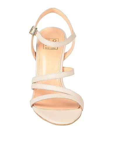 https://images.styletyx.com/images/beige-leather-sandals-nora-new-york-3313915_4.webp