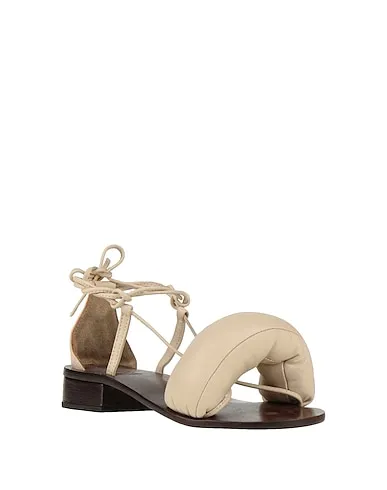 https://images.styletyx.com/images/beige-leather-sandals-room-13329283_2.webp