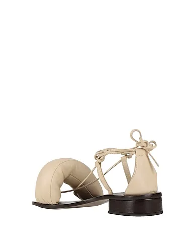 https://images.styletyx.com/images/beige-leather-sandals-room-13329283_3.webp