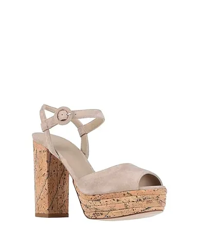 https://images.styletyx.com/images/beige-mules-and-clogs-le-silla-1574304_2.webp