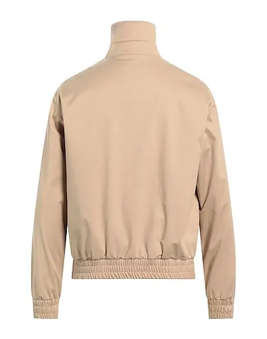 https://images.styletyx.com/images/beige-plain-weave-bomber-sandro-13335954_2.webp