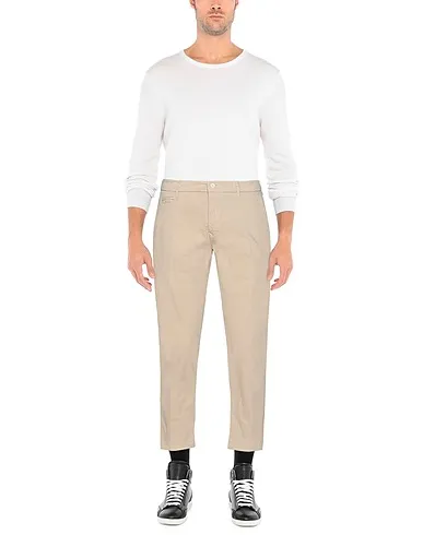 https://images.styletyx.com/images/beige-plain-weave-casual-pants-0-zero-construction-1515473_2.webp