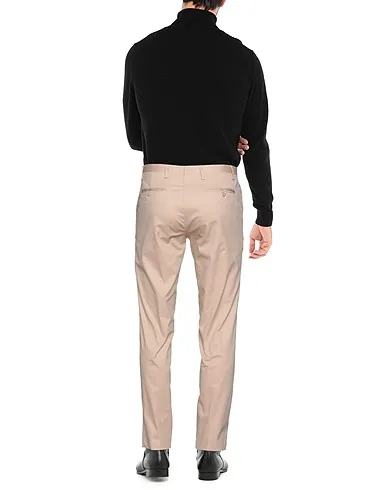 https://images.styletyx.com/images/beige-plain-weave-casual-pants-hamaki-ho-1540349_3.webp