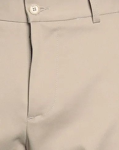 https://images.styletyx.com/images/beige-plain-weave-casual-pants-roberto-p-luxury-13342933_4.webp