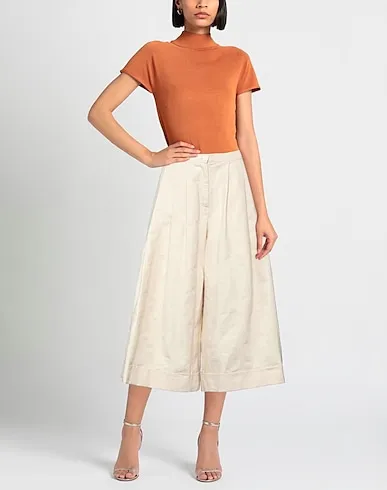https://images.styletyx.com/images/beige-plain-weave-cropped-pants-culottes-virginia-bizzi-3199338_2.webp